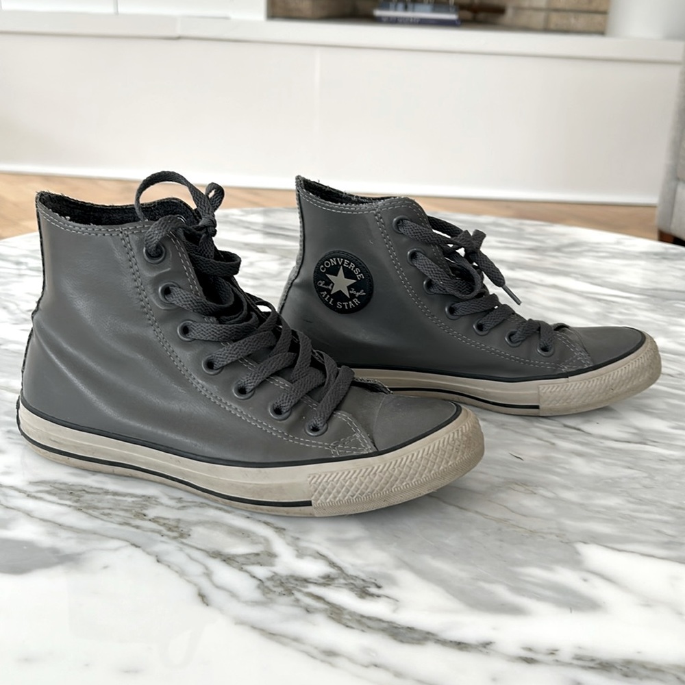 Converse women’s grey rubberized high tops
